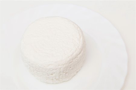 Cottage cheese on the white plate Stock Photo - Budget Royalty-Free & Subscription, Code: 400-04833855