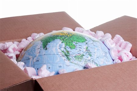 simsearch:400-06737278,k - Close-up of a globe in a delivery box. Stock Photo - Budget Royalty-Free & Subscription, Code: 400-04845184