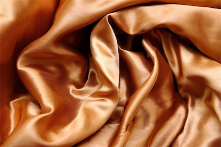 satin cloth decoration - gold crumpled silk fabric textured background Stock Photo - Budget Royalty-Free & Subscription, Code: 400-04845692