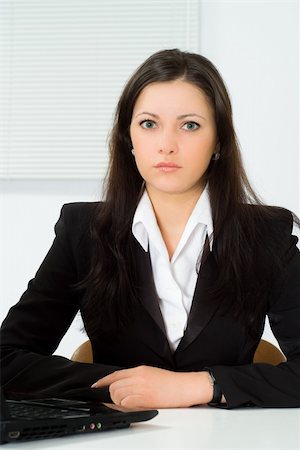 space suit model - beautiful girl in a business suit working in the office Stock Photo - Budget Royalty-Free & Subscription, Code: 400-04845926