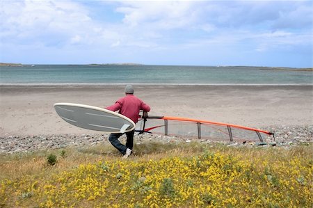 simsearch:400-03992760,k - windsurfer getting equipment ready on the beach in the maharees county kerry ireland Stock Photo - Budget Royalty-Free & Subscription, Code: 400-04845975