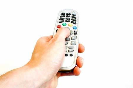 Hand with remote control isolated on white background Stock Photo - Budget Royalty-Free & Subscription, Code: 400-04846433