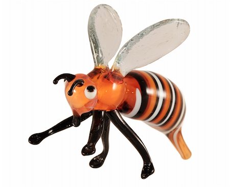 Glass statuette - little bee on white background Photographie de stock - Aubaine LD & Abonnement, Code: 400-04847259