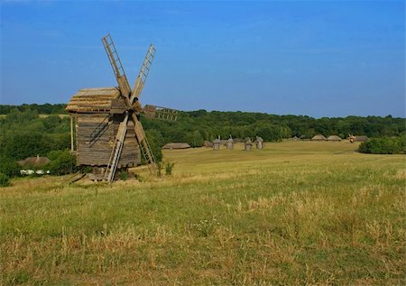 simsearch:400-05319608,k - The old windmill in the village has historically been used previously for the production of flour. windmill is a beautiful landscape decoration Stock Photo - Budget Royalty-Free & Subscription, Code: 400-04847591