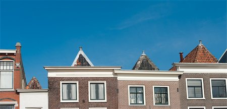 monumental facades of houses at a canal in Leiden, Netherlands Stock Photo - Budget Royalty-Free & Subscription, Code: 400-04849000