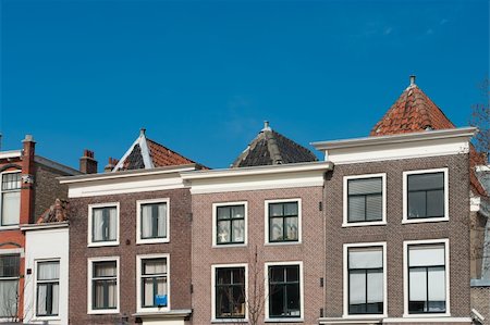 monumental facades of houses at a canal in Leiden, Netherlands Stock Photo - Budget Royalty-Free & Subscription, Code: 400-04849001