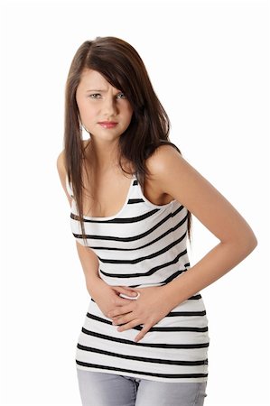 Young woman with stomach issues,isolated on white Stock Photo - Budget Royalty-Free & Subscription, Code: 400-04849924