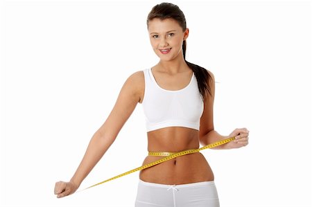 simsearch:400-07219376,k - Woman measuring perfect shape of beautiful body. Healthy lifestyles concept Stock Photo - Budget Royalty-Free & Subscription, Code: 400-04849930