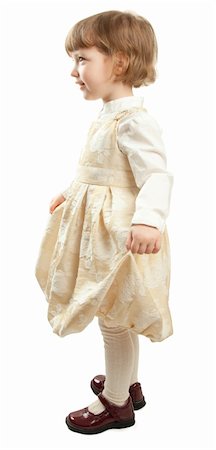 Dancing little girl in dress. Studio shot isolated on white. Stock Photo - Budget Royalty-Free & Subscription, Code: 400-04843558