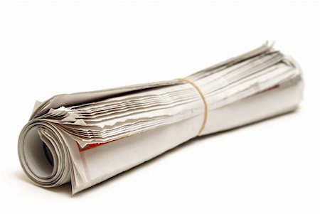 An isolated newspaper that has been rolled and banded. Stock Photo - Budget Royalty-Free & Subscription, Code: 400-04854026