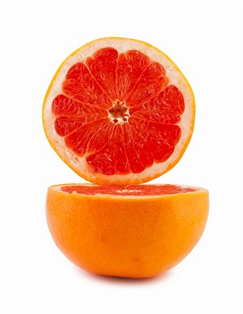 simsearch:400-06513460,k - grapefruit cut in half isolated on white background Stock Photo - Budget Royalty-Free & Subscription, Code: 400-04854590