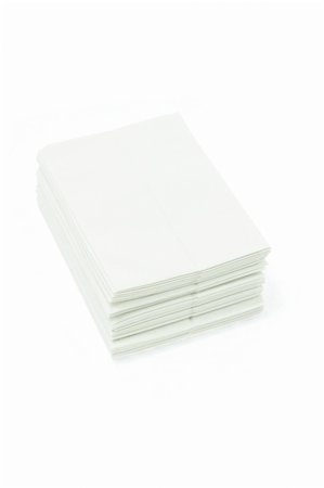 simsearch:400-05370670,k - Stack of folded disposable tissue papers on white background Stock Photo - Budget Royalty-Free & Subscription, Code: 400-04855635