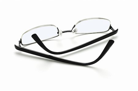 simsearch:400-07774329,k - spectacles lying on white background Stock Photo - Budget Royalty-Free & Subscription, Code: 400-04855765