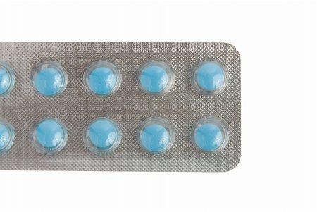 simsearch:400-04000864,k - Close-up of a pack of blue pills isolated on white background. Stock Photo - Budget Royalty-Free & Subscription, Code: 400-04851041