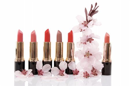 different red lipstick and cherry flower, beauty concept on white background Stock Photo - Budget Royalty-Free & Subscription, Code: 400-04851433