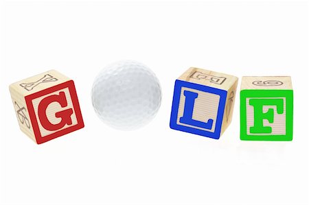 simsearch:600-02346205,k - Golf ball and alphabet blocks on white background Stock Photo - Budget Royalty-Free & Subscription, Code: 400-04865417