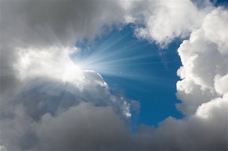 simsearch:400-07661289,k - Deep blue sky with clouds and sunlight rays Stock Photo - Budget Royalty-Free & Subscription, Code: 400-04868848