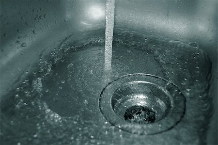 water flow into the drain in the kitchen Stock Photo - Budget Royalty-Free & Subscription, Code: 400-04860802