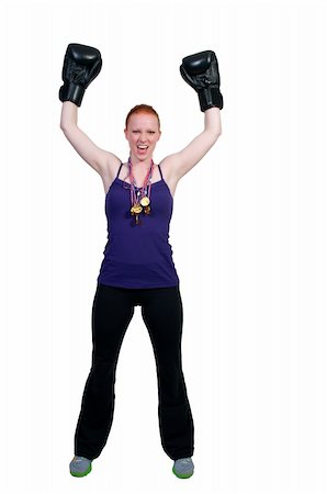 simsearch:400-04970057,k - A beautiful young woman wearing a pair of boxing gloves Stock Photo - Budget Royalty-Free & Subscription, Code: 400-04863199