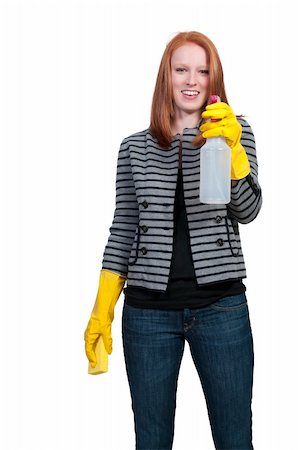 simsearch:400-08693600,k - A glove wearing beautiful woman or maid cleaning house with a sponge and spray bottle with cleaner Stock Photo - Budget Royalty-Free & Subscription, Code: 400-04863192