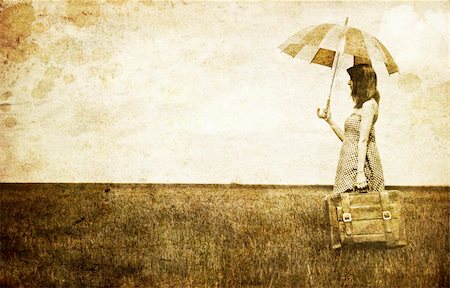 suitcase old - Redhead enchantress with umbrella and suitcase at spring wheat field. Photo in old image style. Stock Photo - Budget Royalty-Free & Subscription, Code: 400-04863872