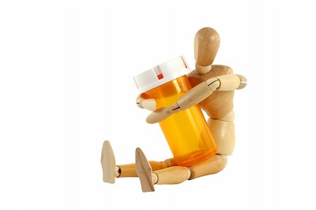 A manikin with pill bottle Stock Photo - Budget Royalty-Free & Subscription, Code: 400-04874474