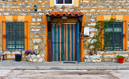 simsearch:400-04393153,k - Detail of the Facade of Spanish Homes Decorated with Flowers Stock Photo - Budget Royalty-Free & Subscription, Code: 400-04876120