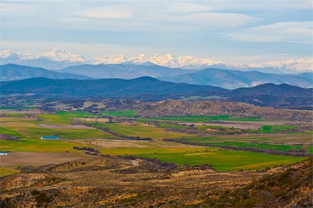 simsearch:400-05711931,k - Spanish Spring Fields on the Background of Snowy Peaks of the Pyrenees Stock Photo - Budget Royalty-Free & Subscription, Code: 400-04876859