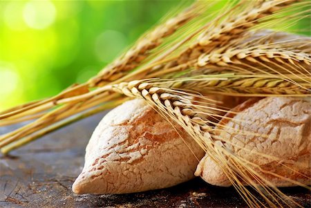 Portuguese bread and mature spikes of wheat. Stock Photo - Budget Royalty-Free & Subscription, Code: 400-04877933