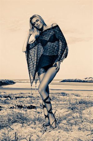 poncho - blond fashion model on beach with poncho. Stock Photo - Budget Royalty-Free & Subscription, Code: 400-04878348