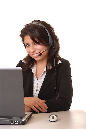 Lovely latina businesswoman hard at work on computer Stock Photo - Budget Royalty-Free & Subscription, Code: 400-04879463