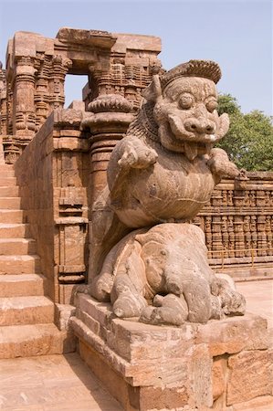 decorated asian elephants - Statue of a lion sitting on an elephant Steps guarding access to the ancient Hindu Temple at Konark, Orissa, India. 13th Century AD. Stock Photo - Budget Royalty-Free & Subscription, Code: 400-04870467