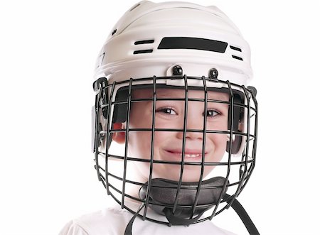 Young boy in hockey helmet isolated on pure white background Stock Photo - Budget Royalty-Free & Subscription, Code: 400-04870584