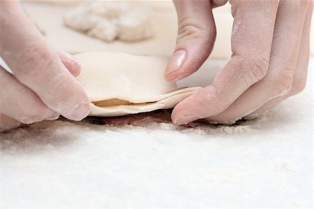 simsearch:649-06845217,k - Pair of hands making pastry with dough. Stock Photo - Budget Royalty-Free & Subscription, Code: 400-04872297