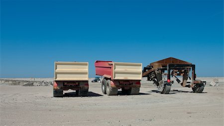 sand trucks on the maasvlakte on the rotterdam harbor Stock Photo - Budget Royalty-Free & Subscription, Code: 400-04873319