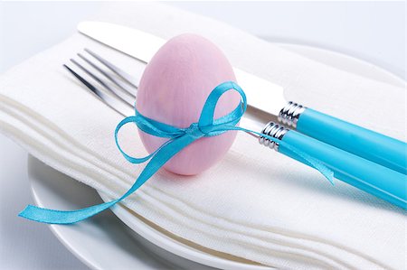 elegant easter decorations - Easter table setting with plates, napkin, silverware and easter egg Stock Photo - Budget Royalty-Free & Subscription, Code: 400-04886699