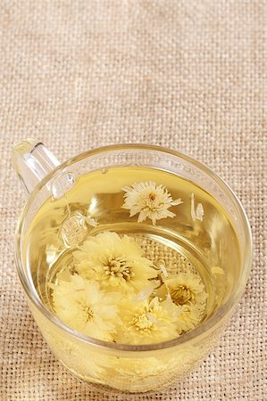 simsearch:400-04273561,k - A cup of flower tea, from chrysanthemums Stock Photo - Budget Royalty-Free & Subscription, Code: 400-04886702