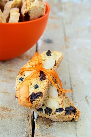 Italian biscotti cookies with a ribbon on a wooden table Stock Photo - Budget Royalty-Free & Subscription, Code: 400-04887069