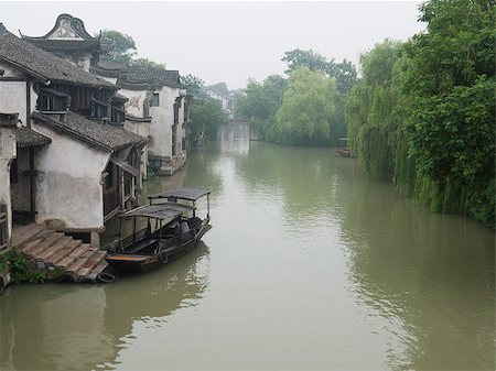 Ancient building near the river in Wuzhen town, Zhejiang province, China Stock Photo - Budget Royalty-Free & Subscription, Code: 400-04887559