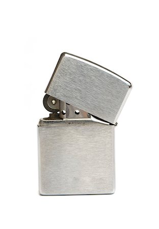 silver zippo lighter isolated on white background Stock Photo - Budget Royalty-Free & Subscription, Code: 400-04887667