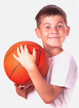 simsearch:400-04833689,k - nice boy has control over Ball for game in basketball  isolated. Stock Photo - Budget Royalty-Free & Subscription, Code: 400-04889286