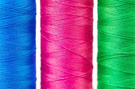 simsearch:400-06079198,k - Colorful spools of thread against a white background Stock Photo - Budget Royalty-Free & Subscription, Code: 400-04881717