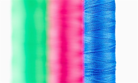 simsearch:400-06079198,k - Colorful spools of thread against a white background Stock Photo - Budget Royalty-Free & Subscription, Code: 400-04881719