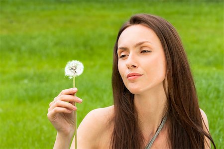 simsearch:400-04399510,k - Girl with dandelion on the green field Stock Photo - Budget Royalty-Free & Subscription, Code: 400-04882796