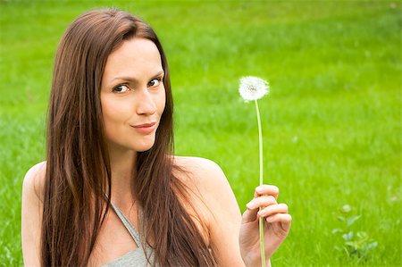 simsearch:400-04399510,k - Girl with dandelion on green field Stock Photo - Budget Royalty-Free & Subscription, Code: 400-04882797