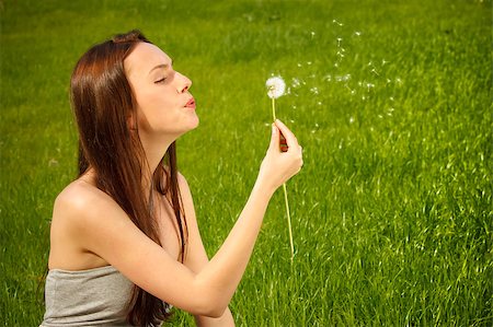 simsearch:400-04399510,k - Girl with dandelion on green field Stock Photo - Budget Royalty-Free & Subscription, Code: 400-04882798