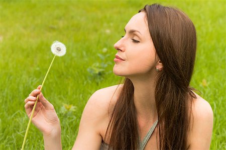 simsearch:400-04399510,k - Girl with dandelion on green field Stock Photo - Budget Royalty-Free & Subscription, Code: 400-04882791