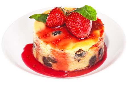 simsearch:400-05173009,k - Cheesecake with fresh strawberries on white plate closeup Stock Photo - Budget Royalty-Free & Subscription, Code: 400-04882823
