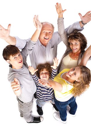 simsearch:400-07426233,k - Aerial view of cheerful family with raised arms and looking at camera.. Stock Photo - Budget Royalty-Free & Subscription, Code: 400-04883384