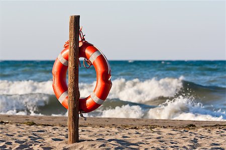 lifebuoy on the sandy beach of the Mediterranean Stock Photo - Budget Royalty-Free & Subscription, Code: 400-04894583